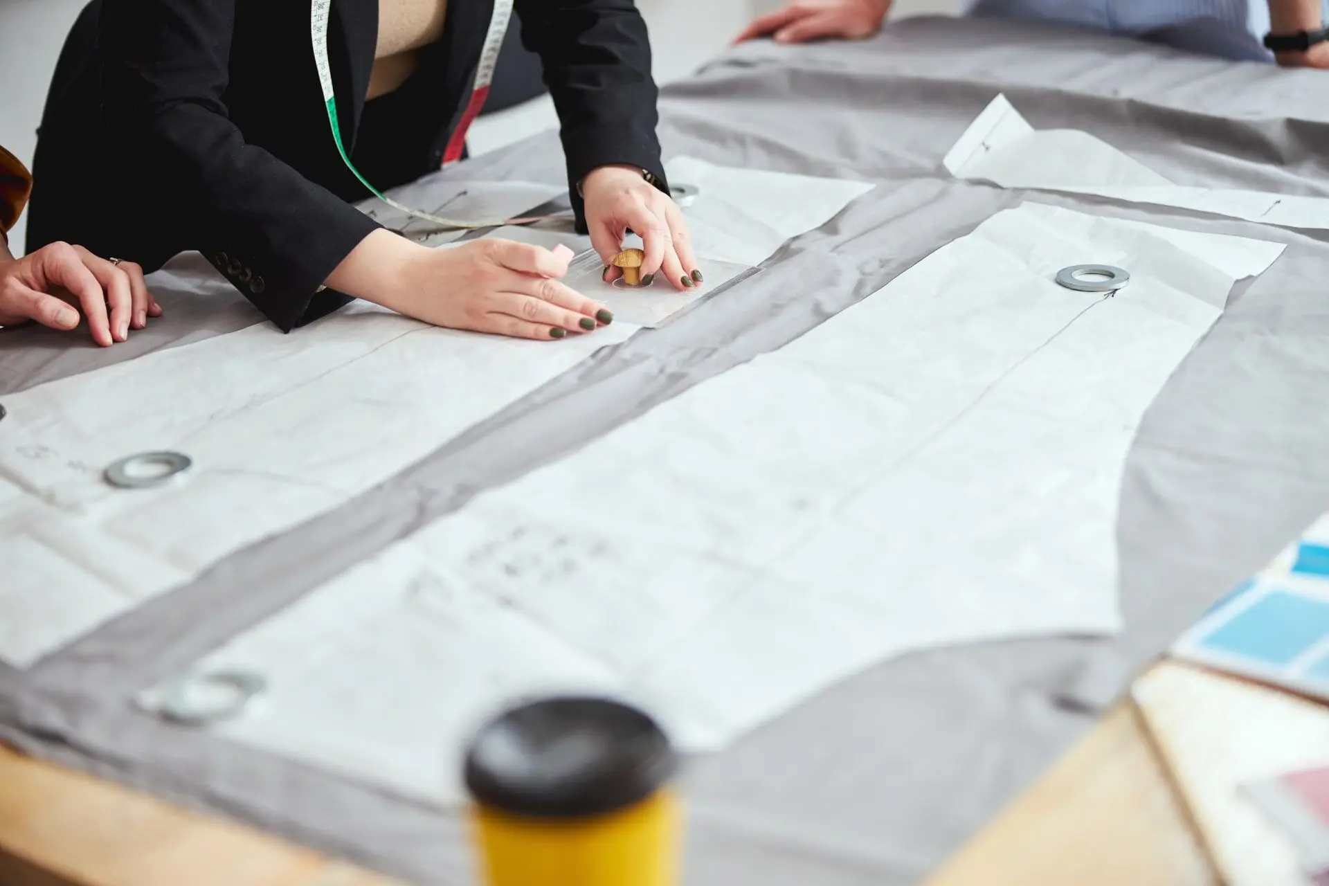 large-piece-of-sewing-pattern-in-tailoring-establi-2025-03-06-01-07-14-utc (1)-min.webp